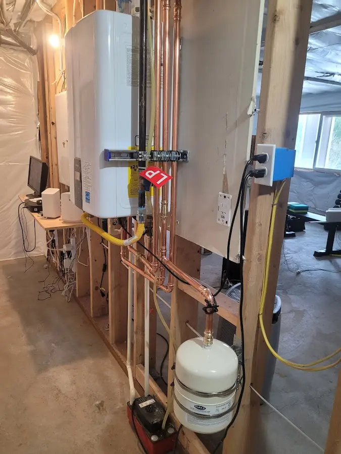 Licensed plumber repairing a kitchen sink in Limerick
